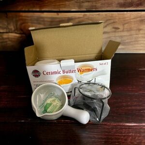 Set of 2 ceramic butter warmers.